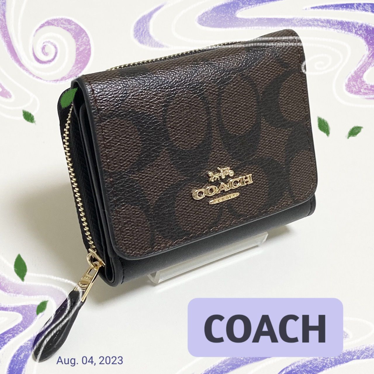 COACH ラグジュアリー シグネチャー レザー スモール トライフォールド