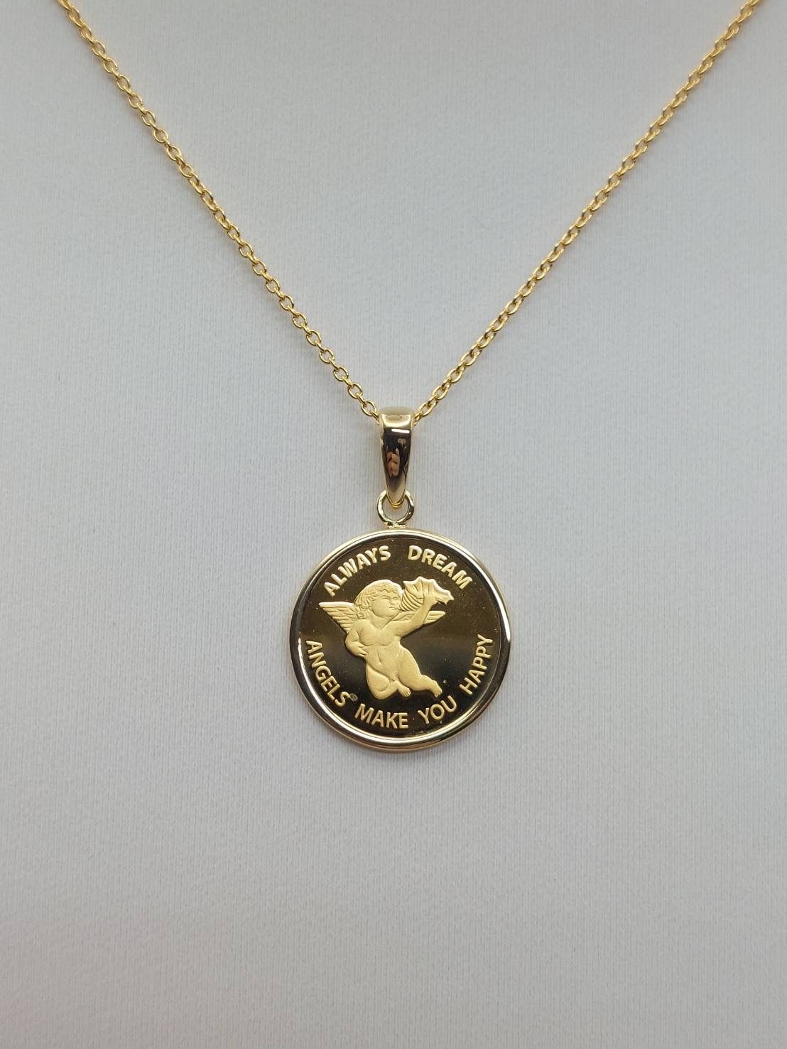 純金 18金 1 25 ozパンプ社製エンジェルコインペンダント