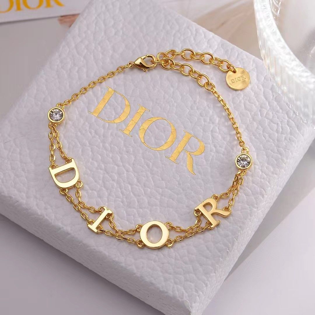 新品未使用DIOR(ディオール) ゴールドトーン ロゴ クリスタル 