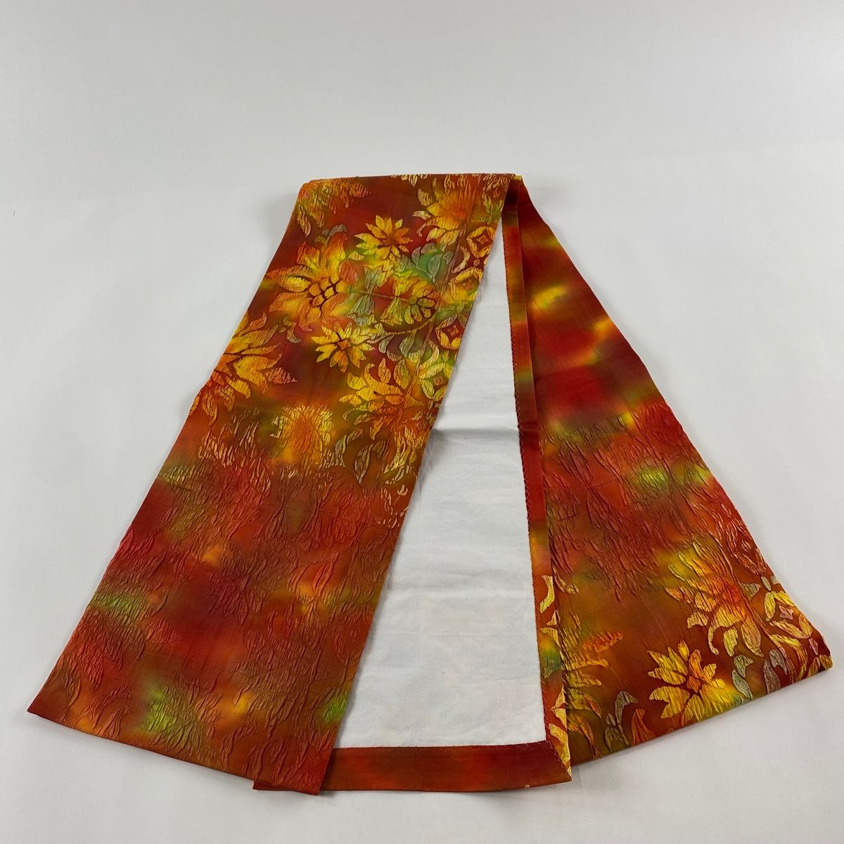 『逸品』紬地の開き名古屋帯　美品 開き名古屋帯 美品 優品 紬地 草花 ぼかし柄 縮緬 朱色 正絹 【中古
