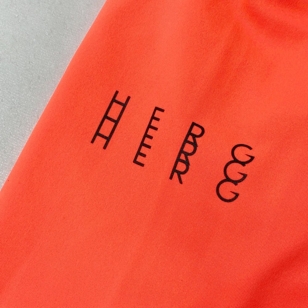 サイズ：M HERG1 エルグワン ハイネック 長袖Tシャツ オレンジ系