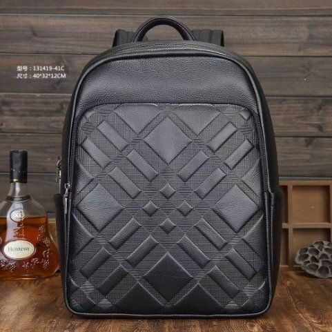 男性のランドセルの新型ビジネスのカジュアルなシンプルなコンピュータのリュックサック牛革の旅行バッグ出張リュックサック頭層