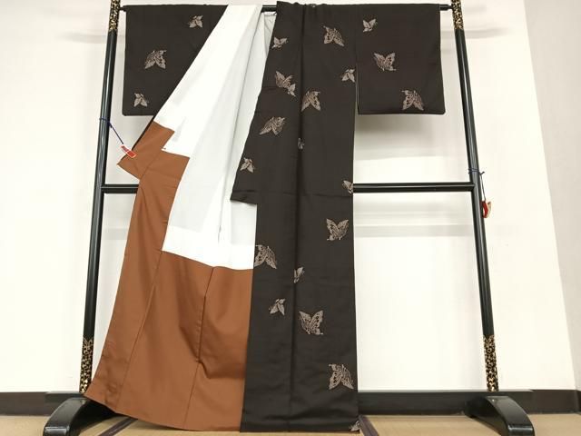 平和屋着物○本場大島紬 泥染め 9マルキ 地空 舞蝶文 正絹 逸品  