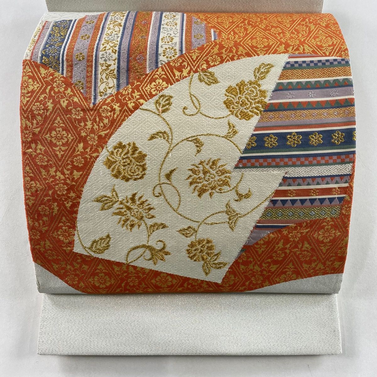 袋帯 秀品 花唐草 草花 金糸 箔 朱色 お太鼓柄 正絹