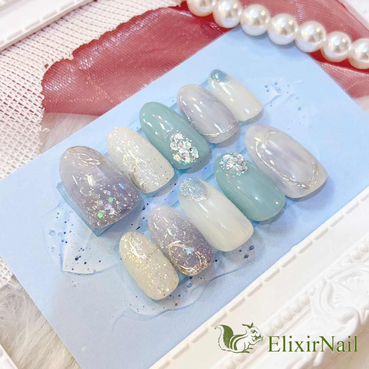 現品】ネイルチップ キラキラ ニュアンス 紫 水色 - メルカリ