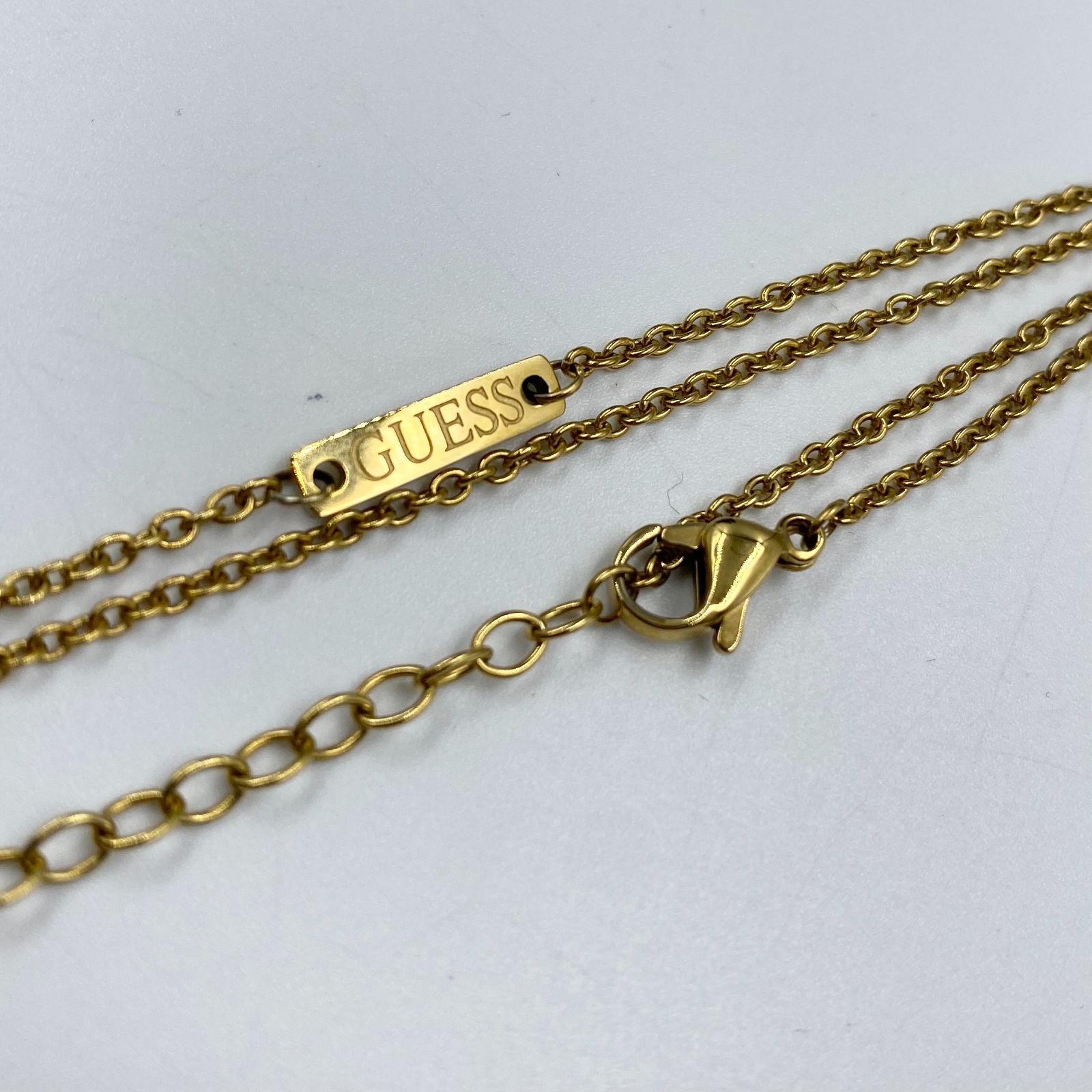 GUESS LOS ANGELES Question Necklace ゲス ゴールド ネックレス 