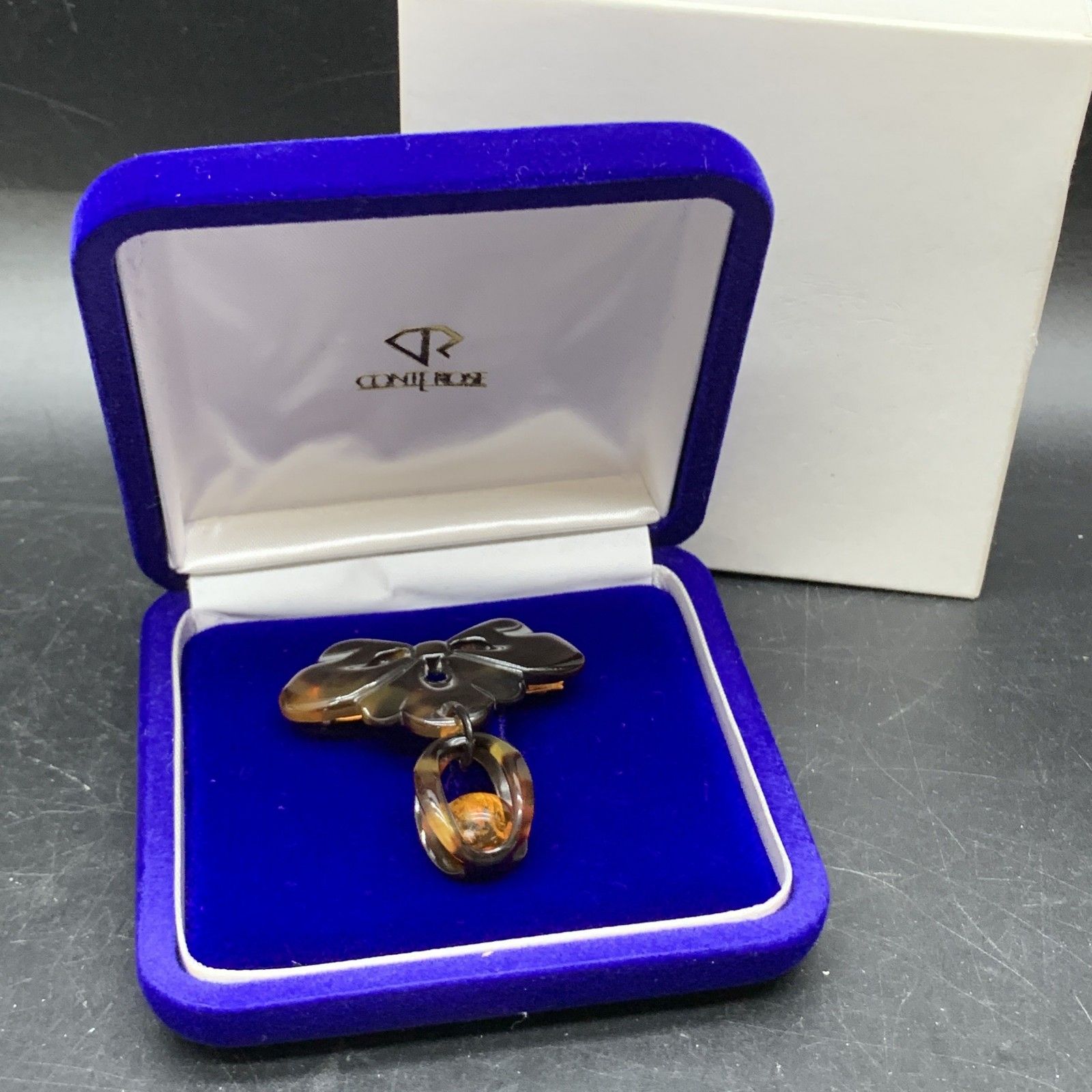 O333未使用保管品　本物　べっ甲柄　琥珀 ブローチ 重量5g 鼈甲色　べっこう色　レディースアクセサリー O333未使用保管品 本物 べっ甲柄 琥珀 ブローチ 重量5g 鼈甲色 べっ