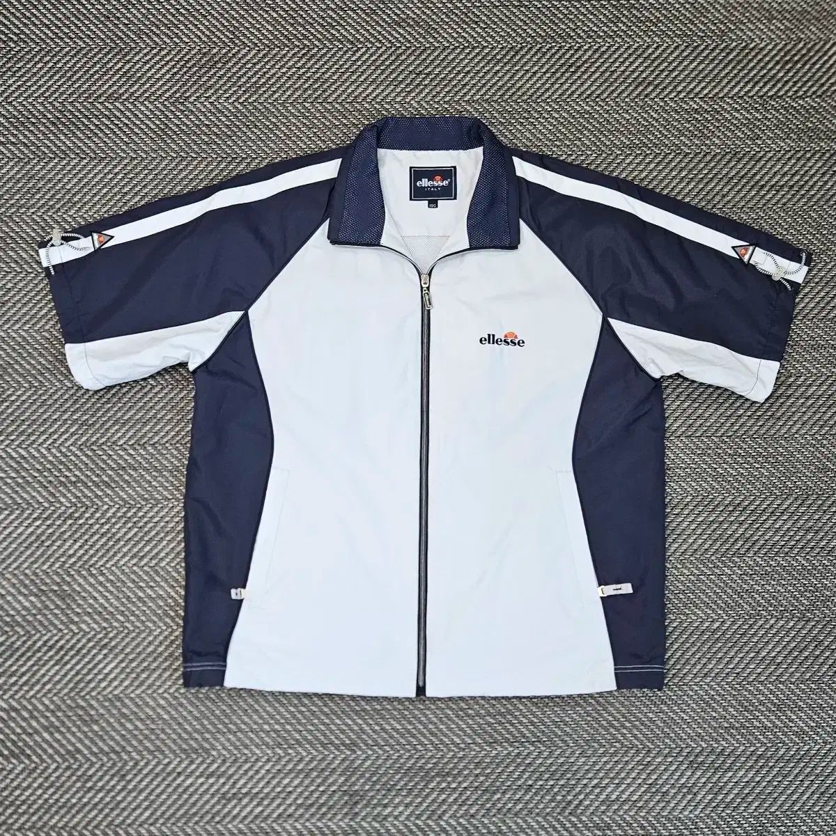 ellesse(エレッセ) ウインドブレーカー 半袖 ジャケット メンズ 100