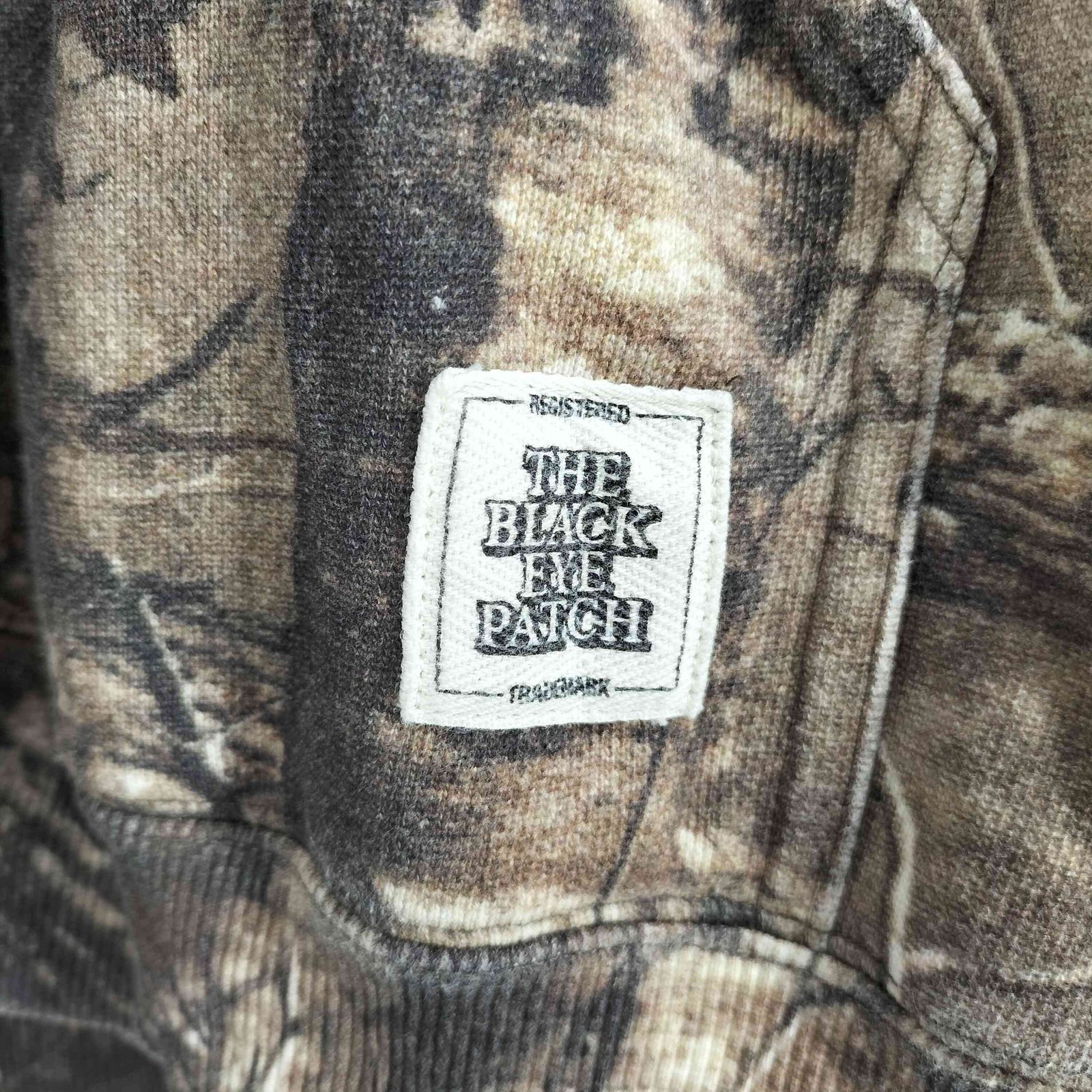 ザブラックアイパッチ THE BLACK EYE PATCH STENCIL LOGO REALTREE 