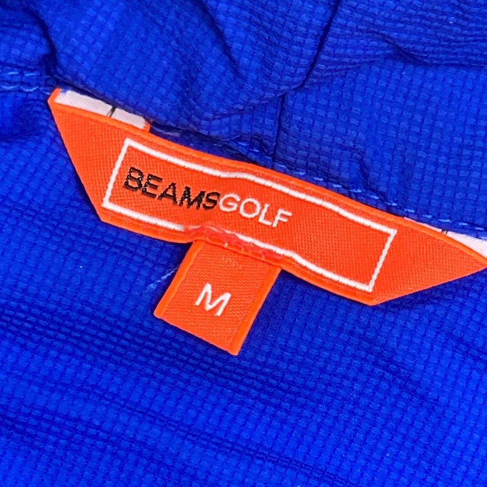 サイズ：M BEAMS GOLF ビームスゴルフ  ナイロンパーカー  ブルー系 [240101360458] ゴルフウェア メンズ ストスト サイズ：M BEAMS GOLF ビームスゴルフ ナイロンパーカー ブルー