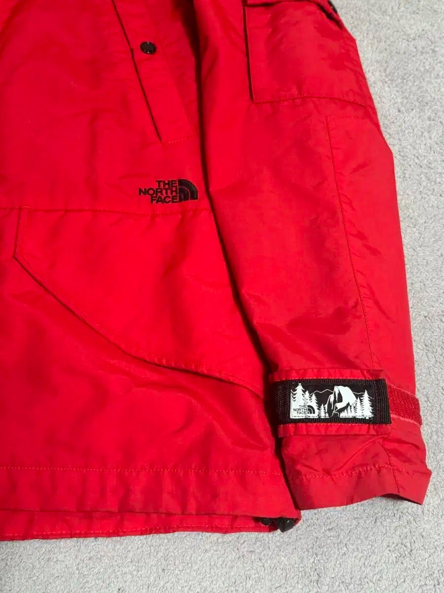 M 100 THE NORTH FACE ザノースフェイス モデル ミッドロゴ レッド マウンテン ウィンドブレーカー