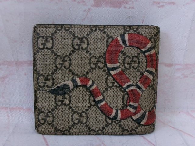 GUCCI スネーク　財布　折りたたみ GUCCI スネーク GGスプリーム二つ折り財布の買取実績 | 買取専門