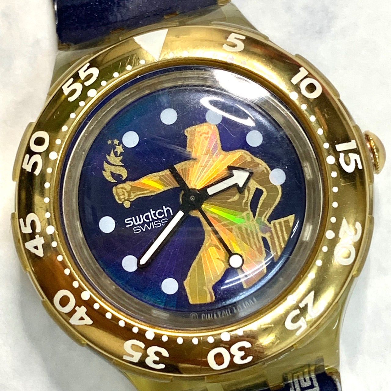 超希少品⭐️SWATCH スウォッチ】 1996年アトランタオリンピック記念時計 スウォッチ ヴィンテージ ネイビー×ゴールドカラー 電池交換済  稼動品 （SNA） - メルカリ