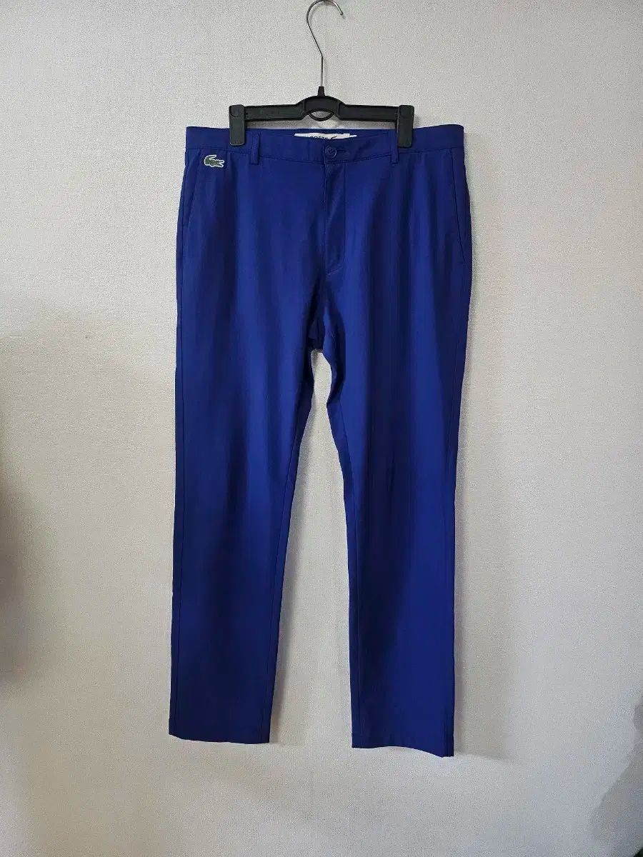 ラコステ ブルー メンズ ズボン 32