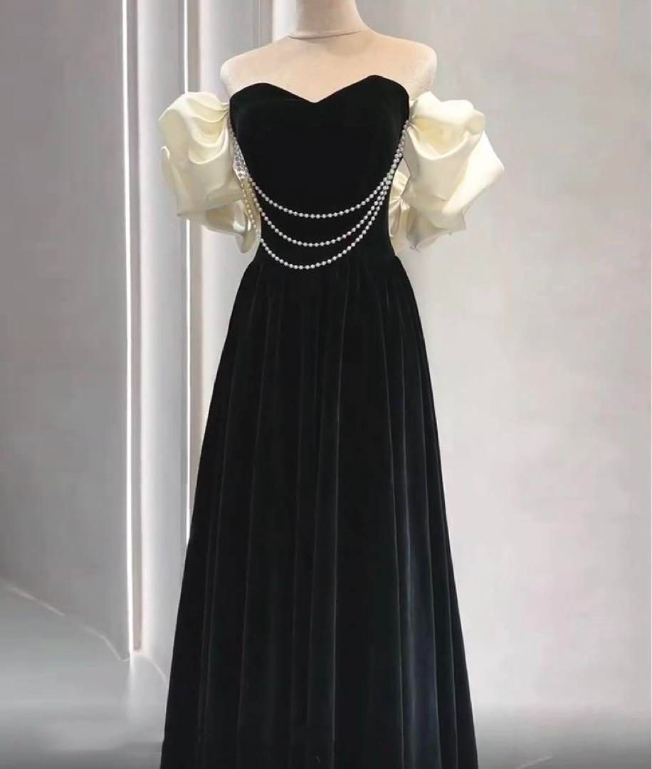 パールにフリルのオフショルがオシャレなイブニングドレス .