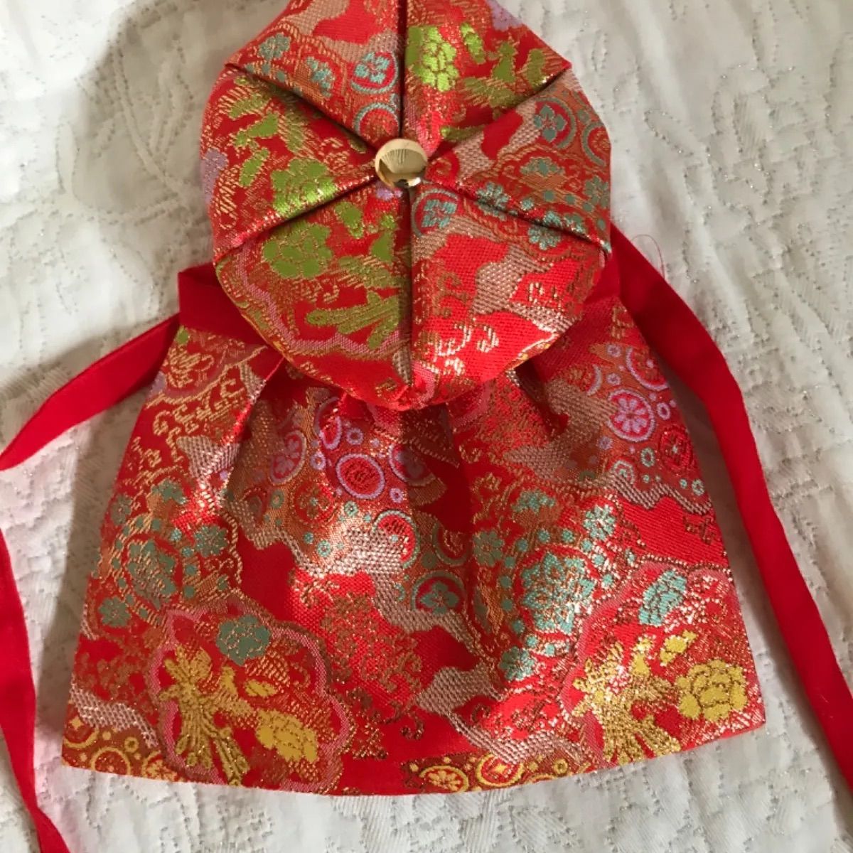 お地蔵様の前掛け 金蘭