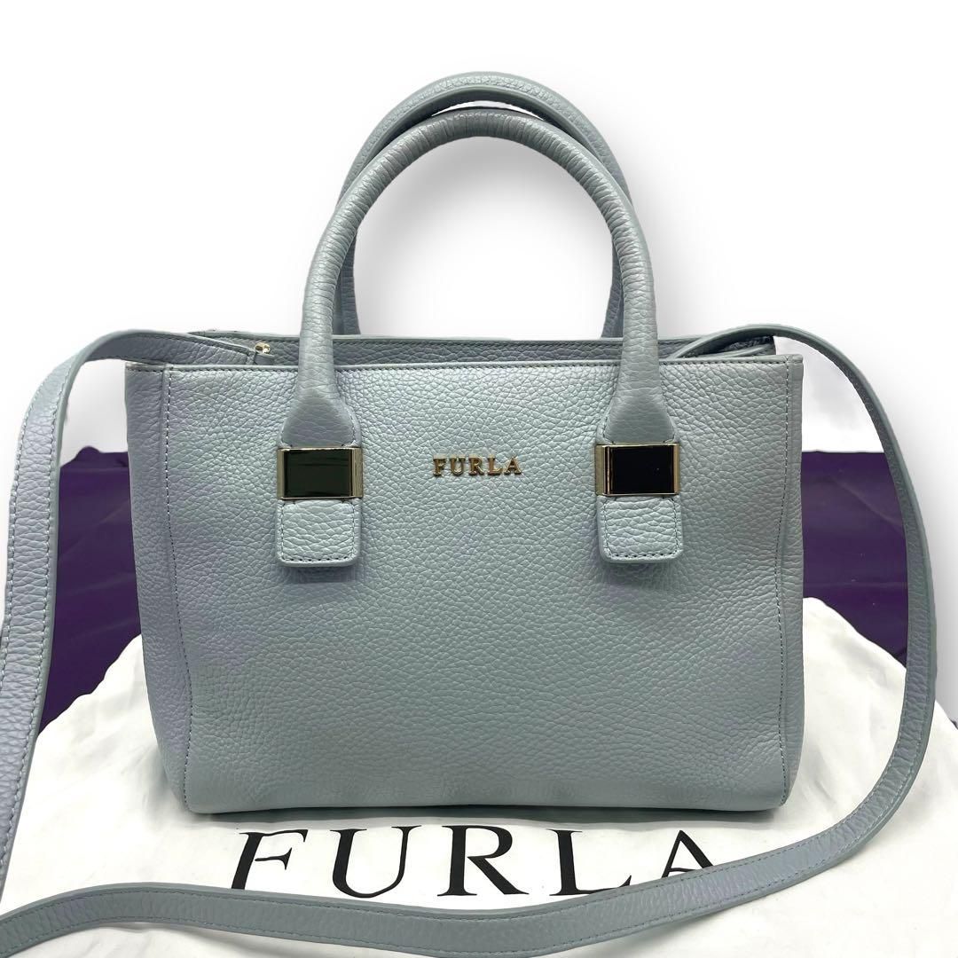 Furla フルラ トートバッグ レザー 水色 ブルー【中古】2way　斜め掛　サイドボタン レディース
