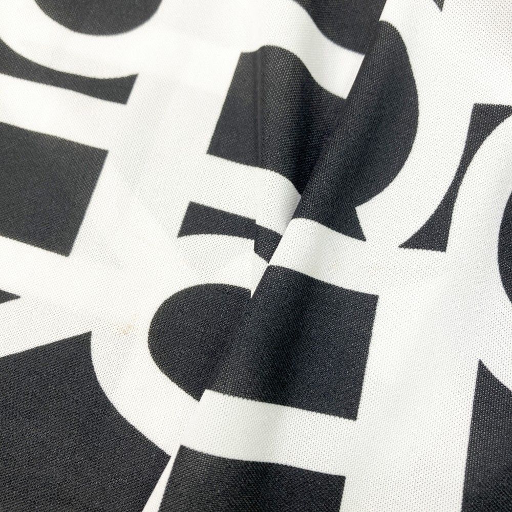 サイズ：XO DESCENTE GOLF デサントゴルフ  半袖ポロシャツ 総柄 ブラック系 [240101368459] ゴルフウェア メンズ ストスト サイズ：XO DESCENTE GOLF デサントゴルフ 半袖ポロシャツ 総柄