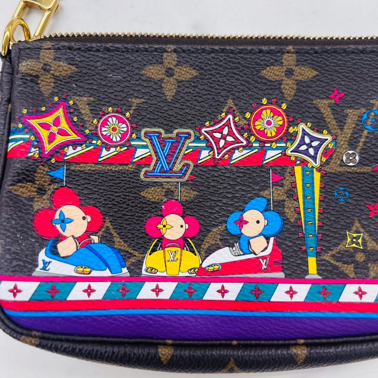 LOUIS VUITTON ルイヴィトン ヴィヴィエンヌ モノグラムホリディ ミニ