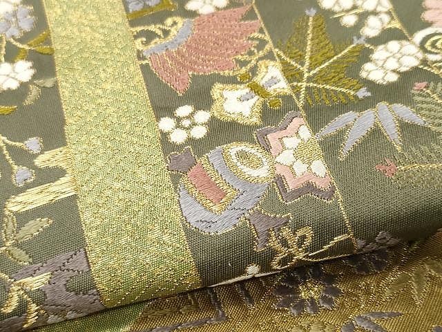 六通柄袋帯 唐織