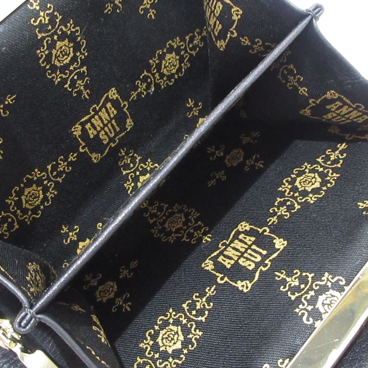 アナスイ 二つ折り財布 星柄 黒 ANNA SUI(アナスイ) 2つ折り財布美品 - 黒 ネコ/スター(星