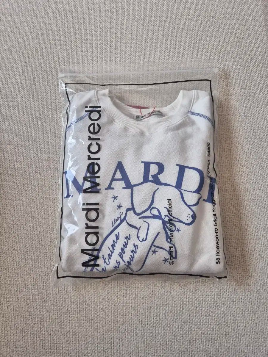 マルディメクルディ ラグランスウェット