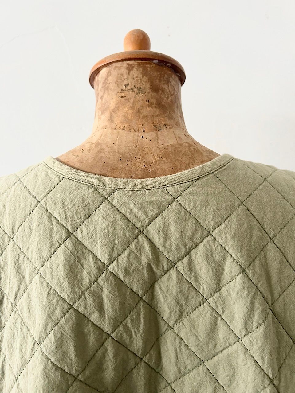 コットンラミーキルティングリバーシブルベスト OLIVE