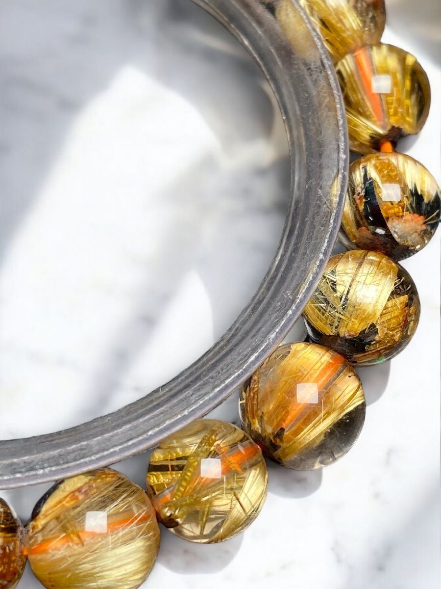 太陽放射タイチンルチル[rXMK]極品位 9.7mm 極上の輝き！最強の金運