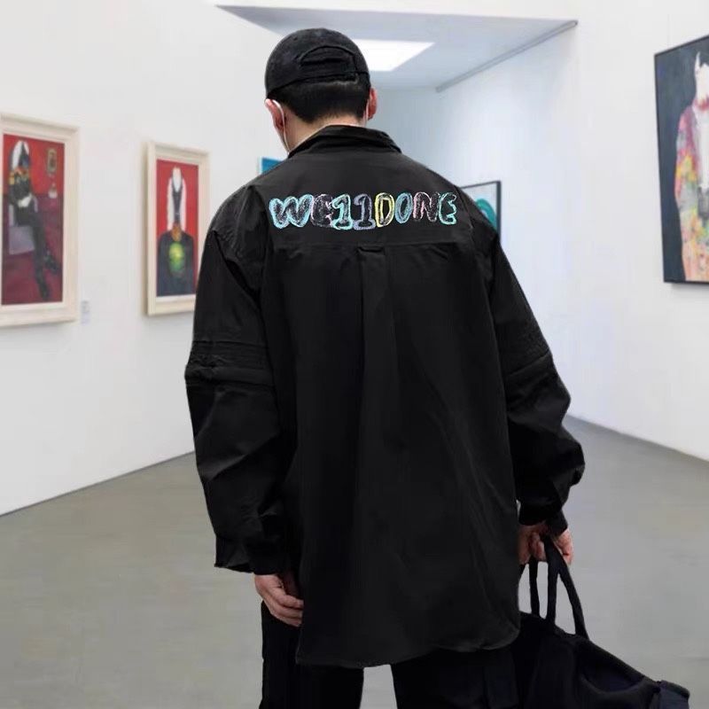カジュアル 背中にカラフルなグラフィティ文字がプリントされた秋の