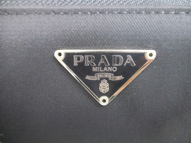 プラダ PRADA ナイロン ラウンドファスナー 札入れ 2つ折り 札入れ コンパクト 財布 メンズ レディース 【未使用保管品】