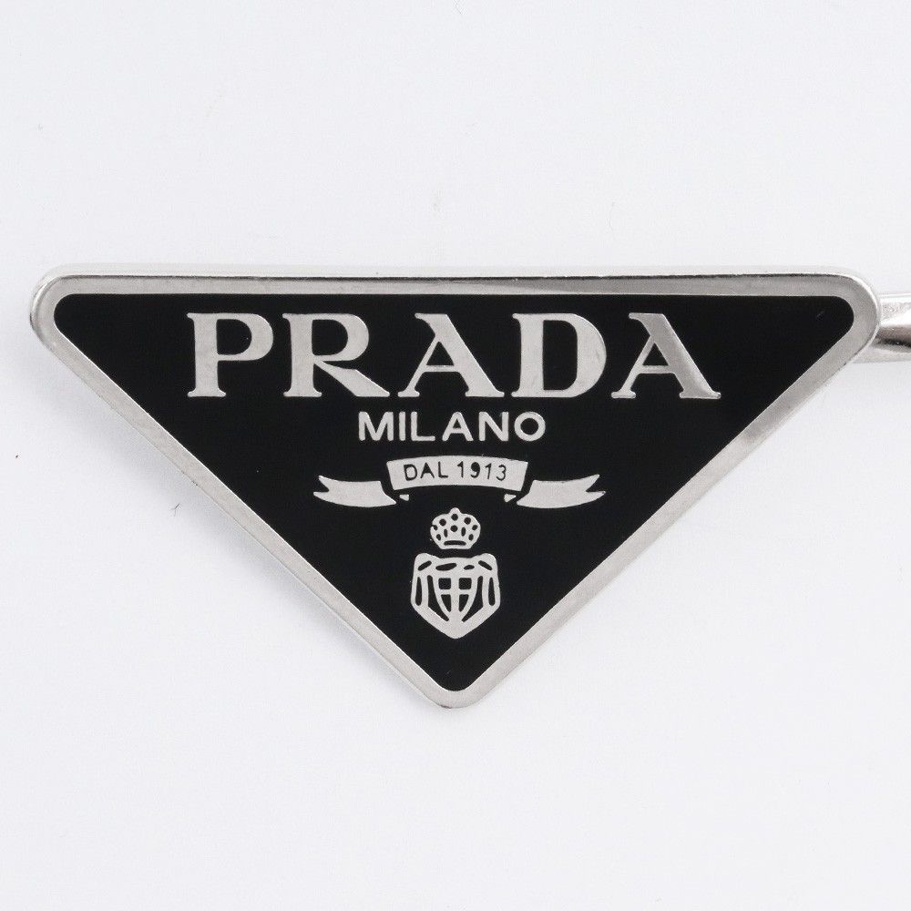 PRADA トライアングルロゴプレート ヘアピン シルバー ブラック PRADA トライアングルロゴプレート ヘアピン シルバー ブラック