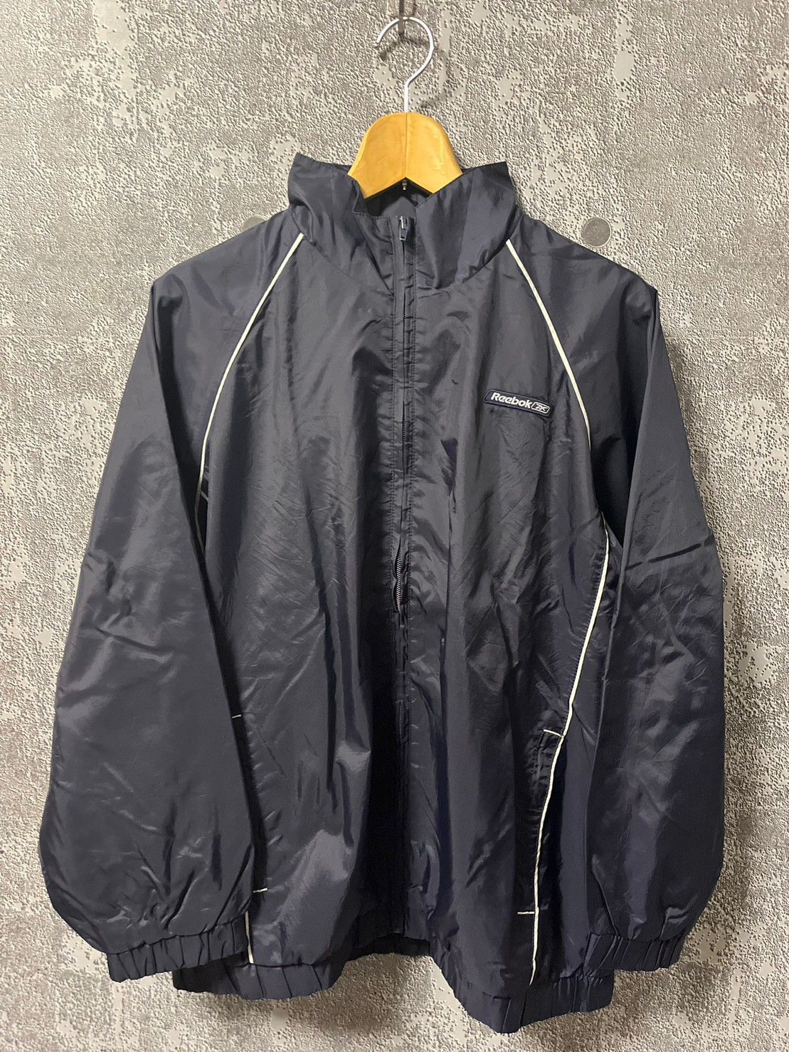 【新品未使用】Reebok リーボック ジュンジー ウィンドブレーカー 4L 新品未使用】Reebok リーボック ジュンジー ウィンドブレーカー