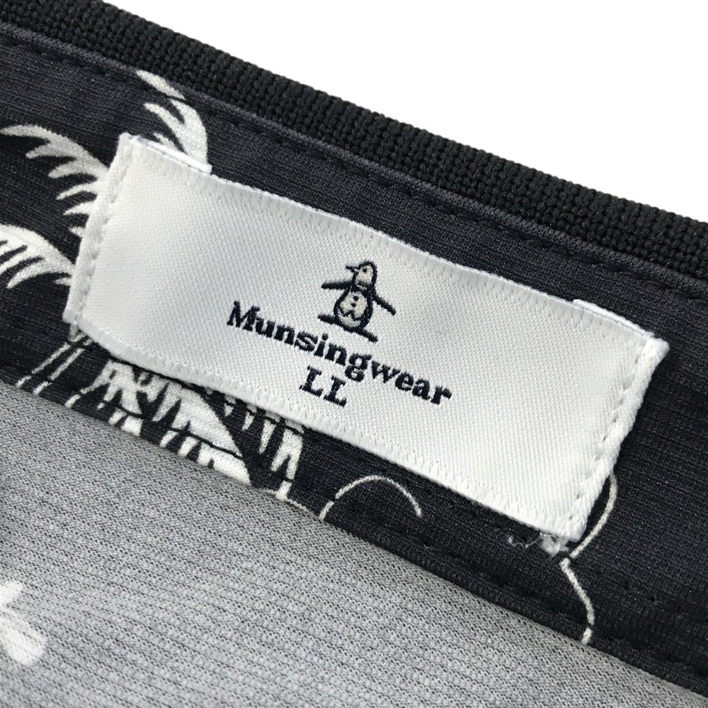 サイズ：LL MUNSING WEAR マンシングウェア  ハーフジップ半袖ワンピース 総柄 ブラック系 [240101437009] ゴルフウェア レディース ストスト サイズ：LL MUNSING WEAR マンシングウェア ハーフジップ半袖