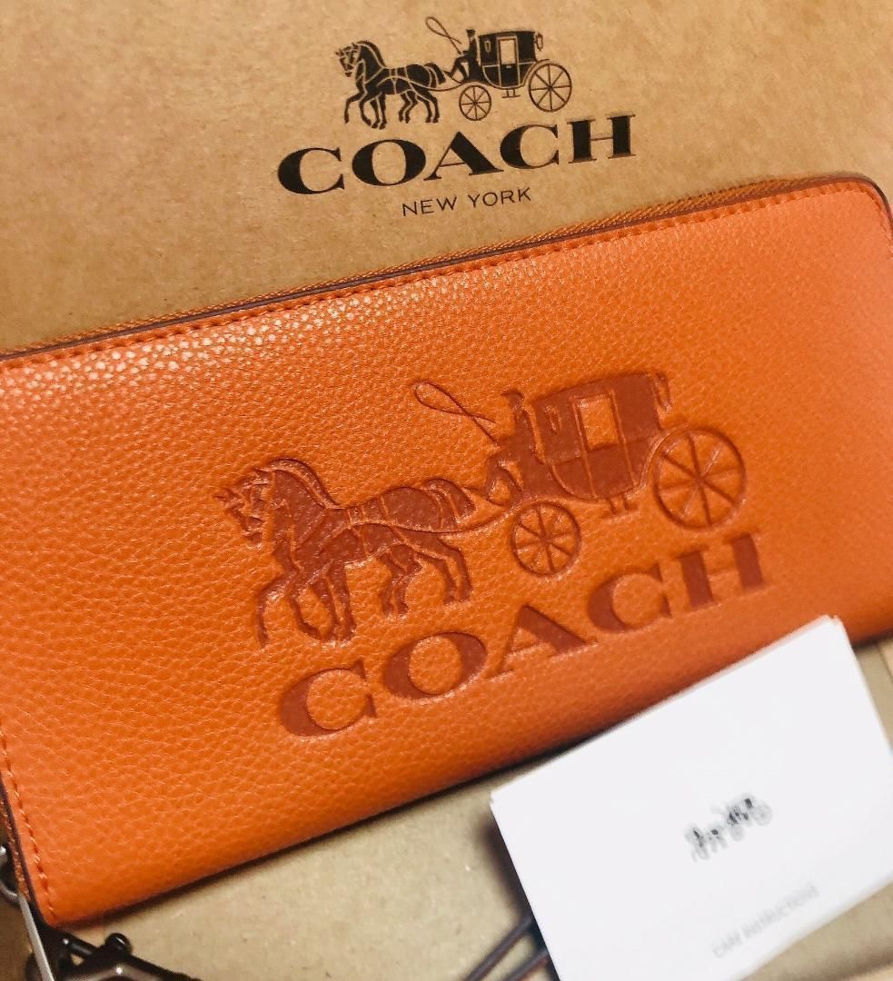 COACH 新品 ジンジャー 馬車 レディース コーチ 長財布 茶 財布 141