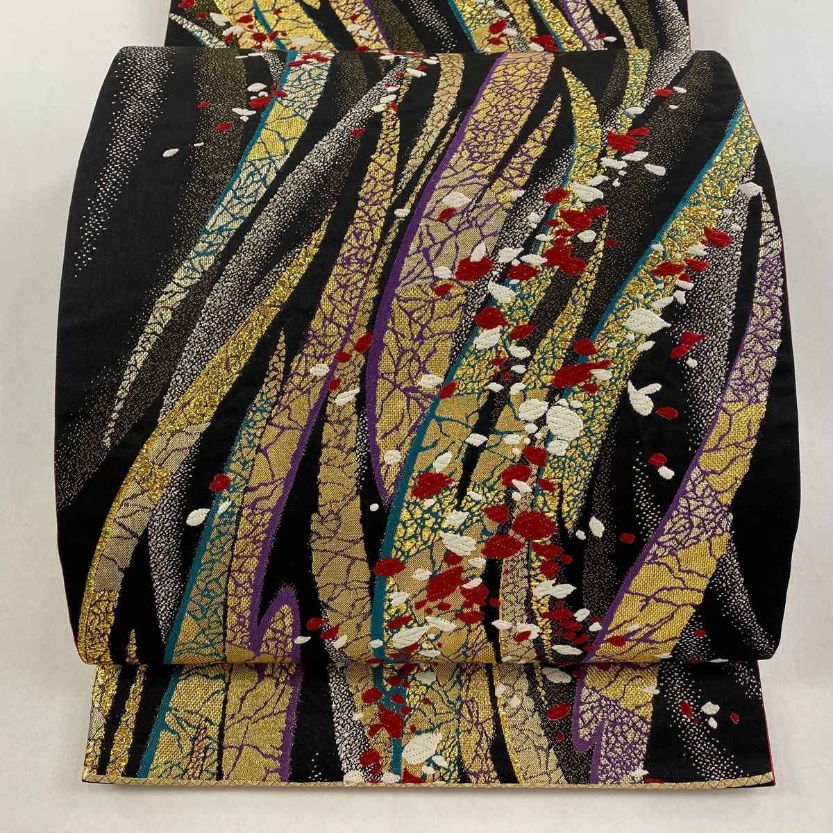 袋帯 秀品 振袖向き 幾何学 花びら 金銀糸 箔 黒 六通 正絹