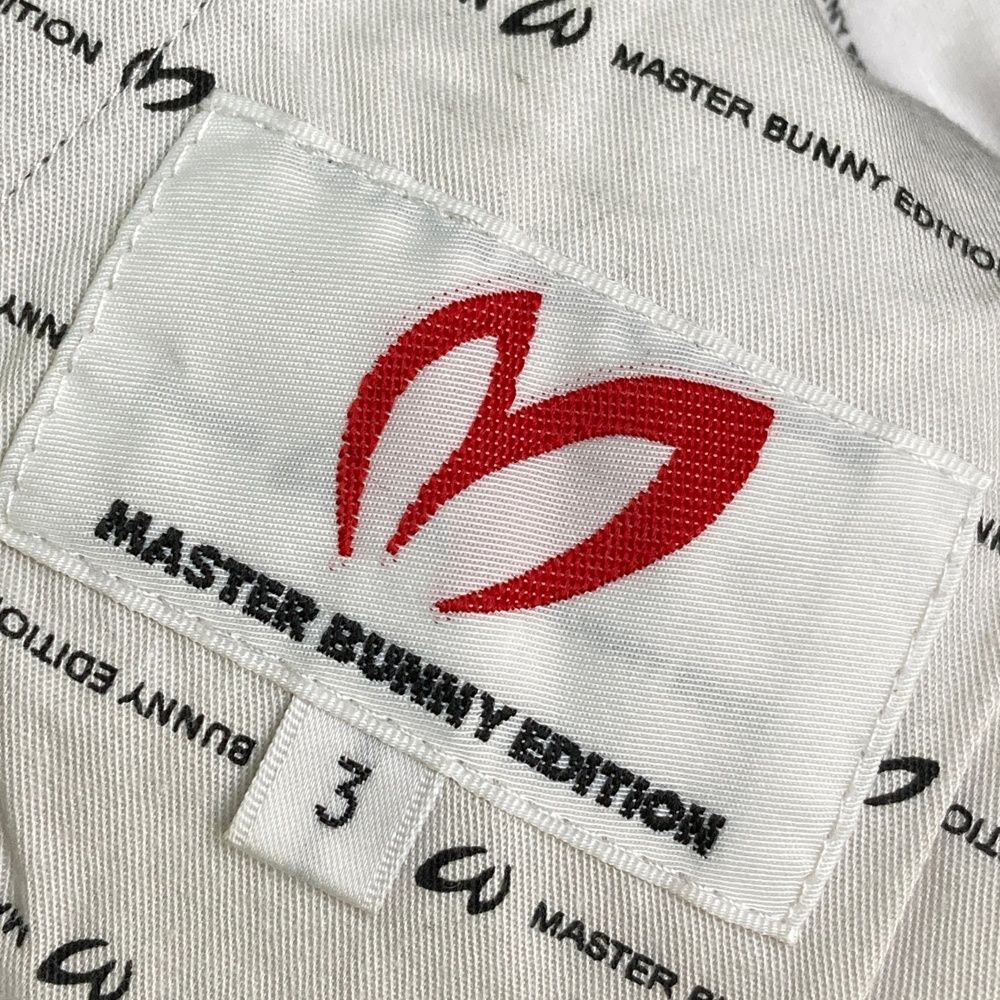 サイズ：3 MASTER BUNNY EDITION マスターバニーエディション  異素材切替 ロングパンツ 総柄 ブラック系 [240101503991] ゴルフウェア メンズ ストスト サイズ：3 MASTER BUNNY EDITION マスターバニーエディション 異