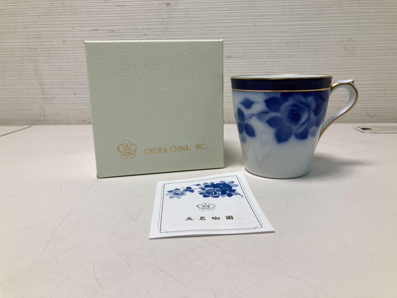 ■未使用y■大倉陶園 OKURA ブルーローズR 100周年記念マグカップ 未使用品（4510）【★38-283】