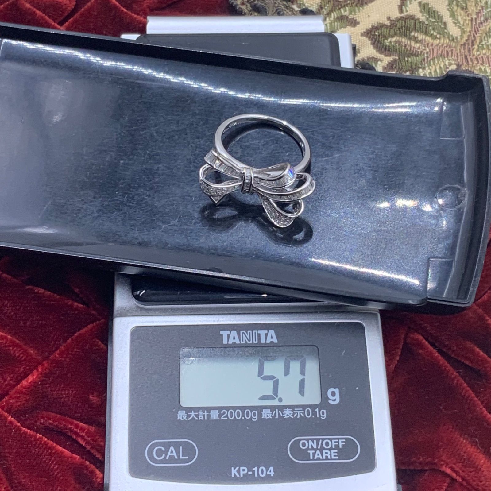 K18WG リボンモチーフ ダイヤリング 5.7g 約17.5号 0.8ct - メルカリ