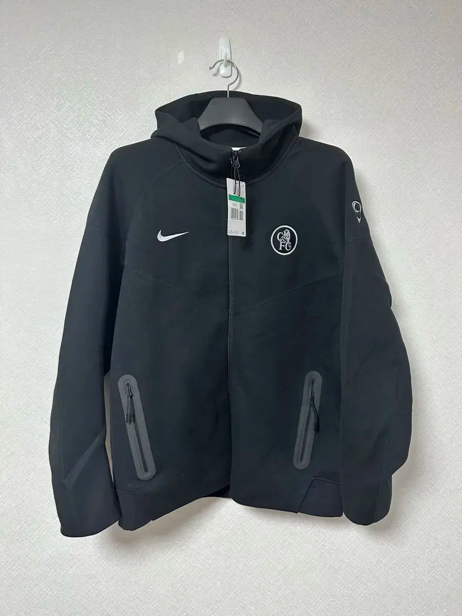 海外 XL チェルシー 25 26 テックフィット テクポリス フード ジップアップ ブラック