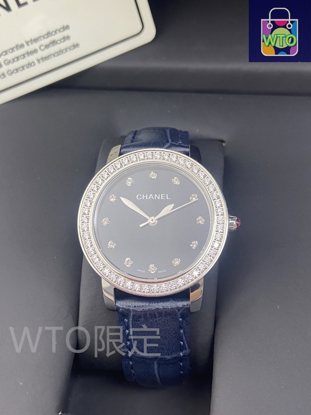 今日特価】Chanel シャネル ベゼルに手作業でスワロフスキー