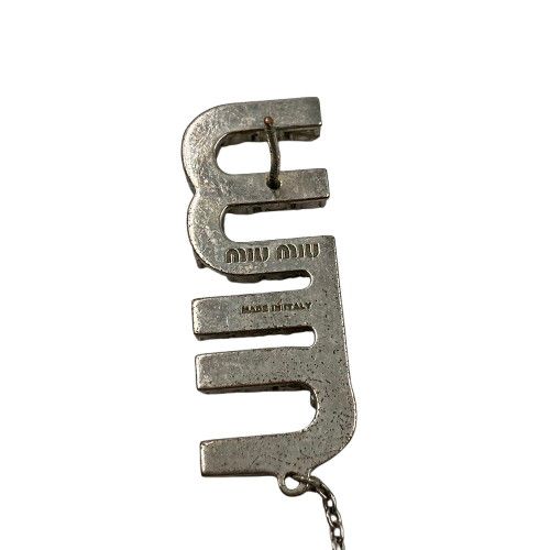 MIUMIU ロゴ ラインストーン ピアス スイング - メルカリ