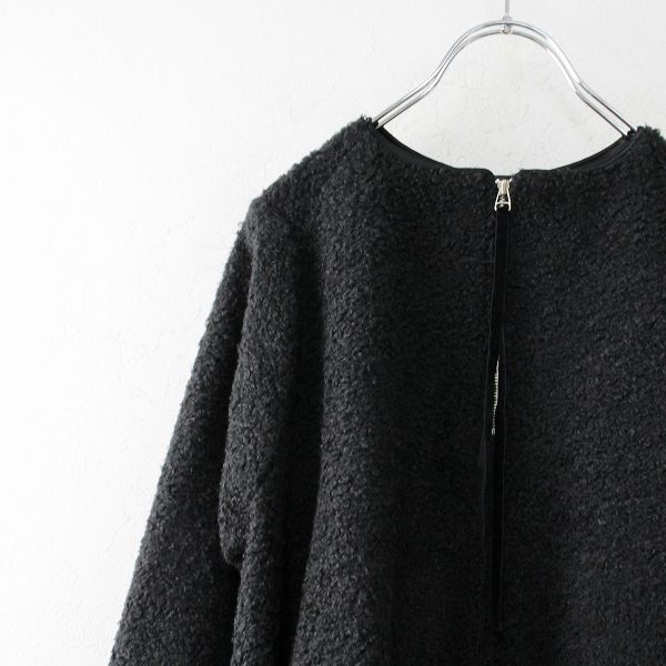 eLLa エラプルオーバー フレアー トップスブラック