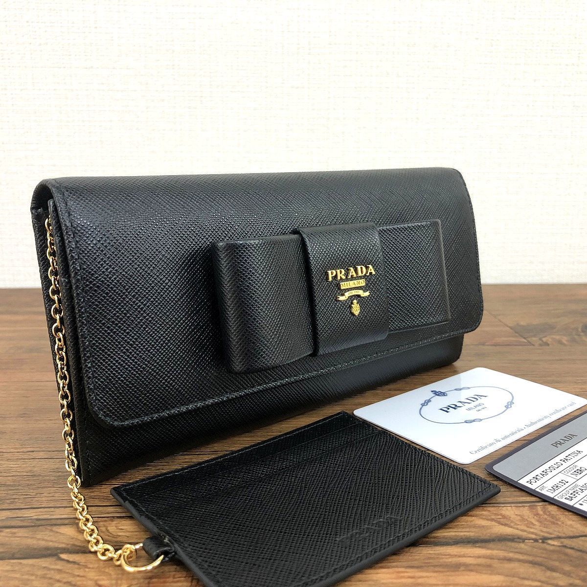 未使用品 PRADA 長財布 1MH132 NERO リボン 133-