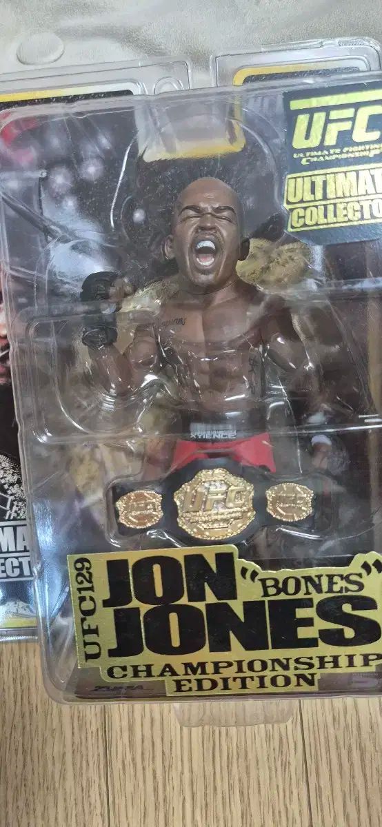 激レア】UFC ジョン・ジョーンズ　フィギュア 新品・未開封 UFC ジョン・ジョーンズフィギュアの通販 by