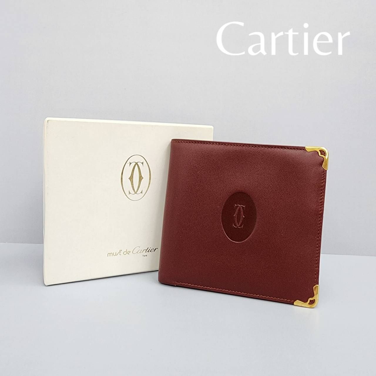 Cartier 二つ折り財布　赤いレザー 二つ折り財布 Cartier 】カルティエ 二つ折り財布 ワインレッド レザー ロゴ