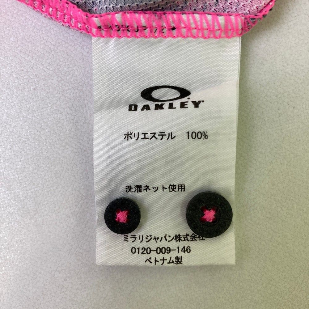 サイズ：L OAKLEY オークリー  半袖ポロシャツ ボタンダウン 総柄 ピンク系 [240101270572] ゴルフウェア メンズ ストスト サイズ：L OAKLEY オークリー 半袖ポロシャツ ボタンダウン 総柄