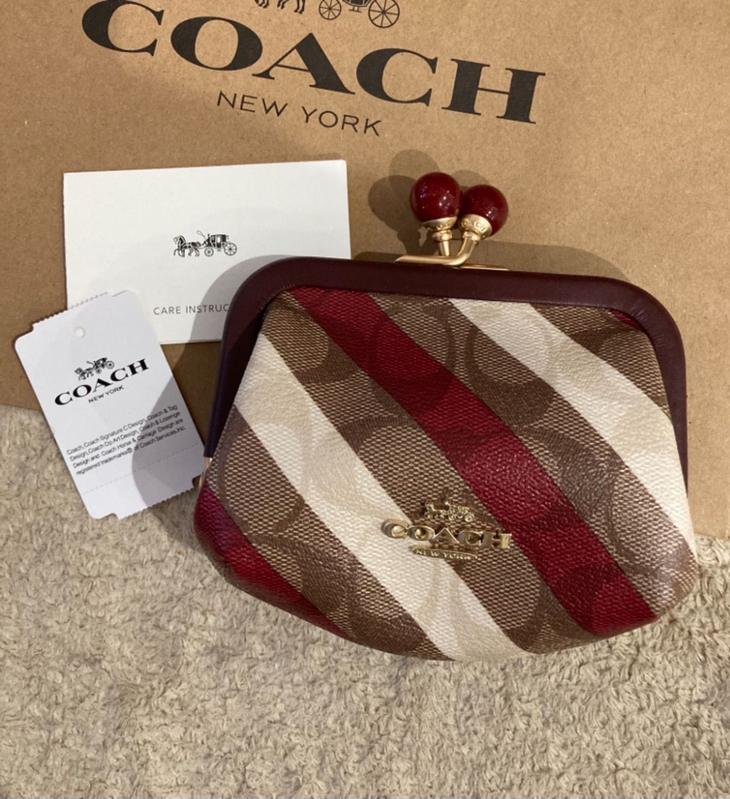 新品】レア♪coach ノラ キスロック がま口コインケース - メルカリ