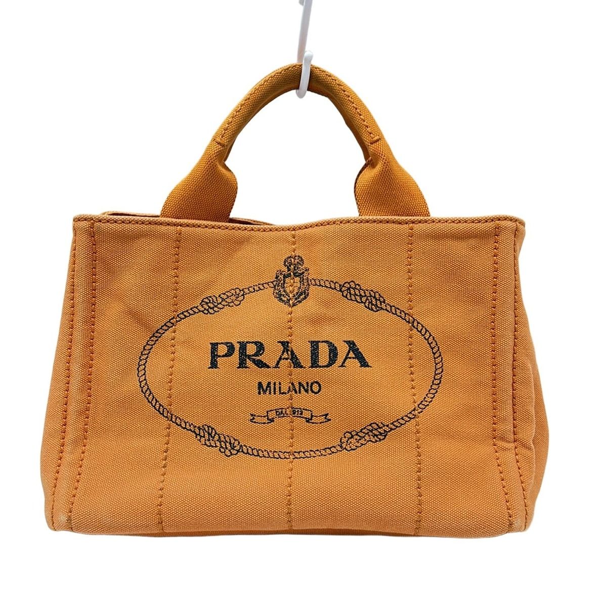PRADA(プラダ) トートバッグ CANAPA オレンジ×黒 - メルカリ