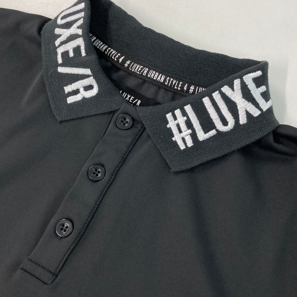 サイズ：L LUXE/R ラグジュ ; 半袖ポロシャツ  ブラック系 [240101425314] ゴルフウェア メンズ ストスト サイズ：L LUXE/R ラグジュ ; 半袖ポロシャツ ブラック系