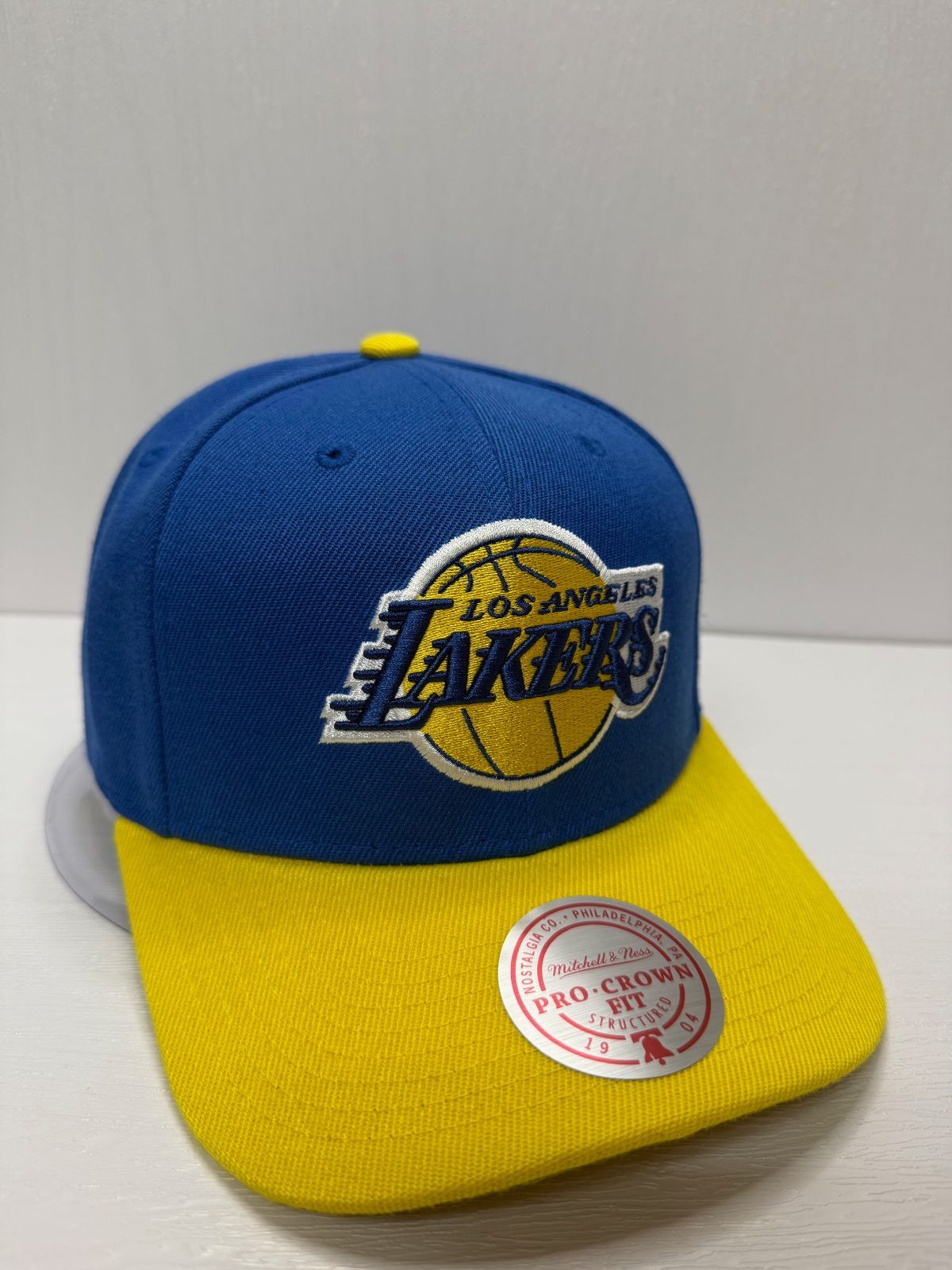 Mitchell&Ness ロサンゼルス レイカーズ 帽子 キャップ 青 黄色 Mitchell&Ness ロサンゼルス レイカーズ 帽子 キャップ 青 黄色